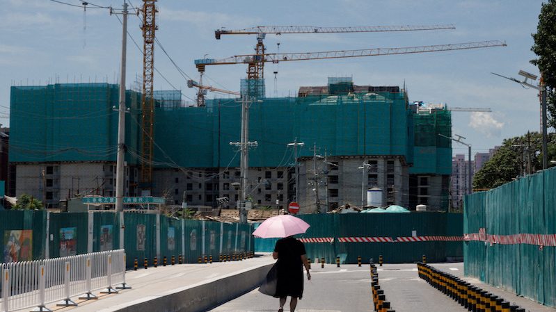 Apartment blocks under construction in Beijing, seen on July 15. China surprised many by cutting its loan prime rates