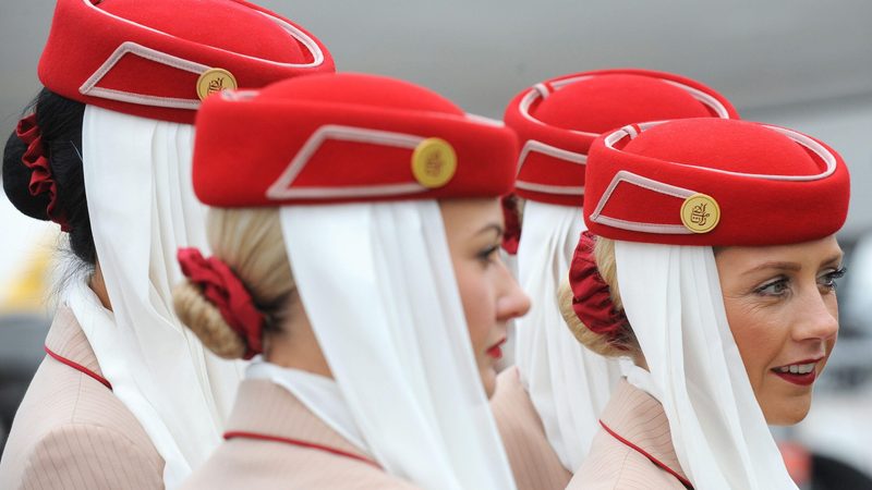 Emirates Airline cabin crew. The Investment Corporation of Dubai owns the airline and has a significant stake in Dubai's biggest bank Emirates NBD