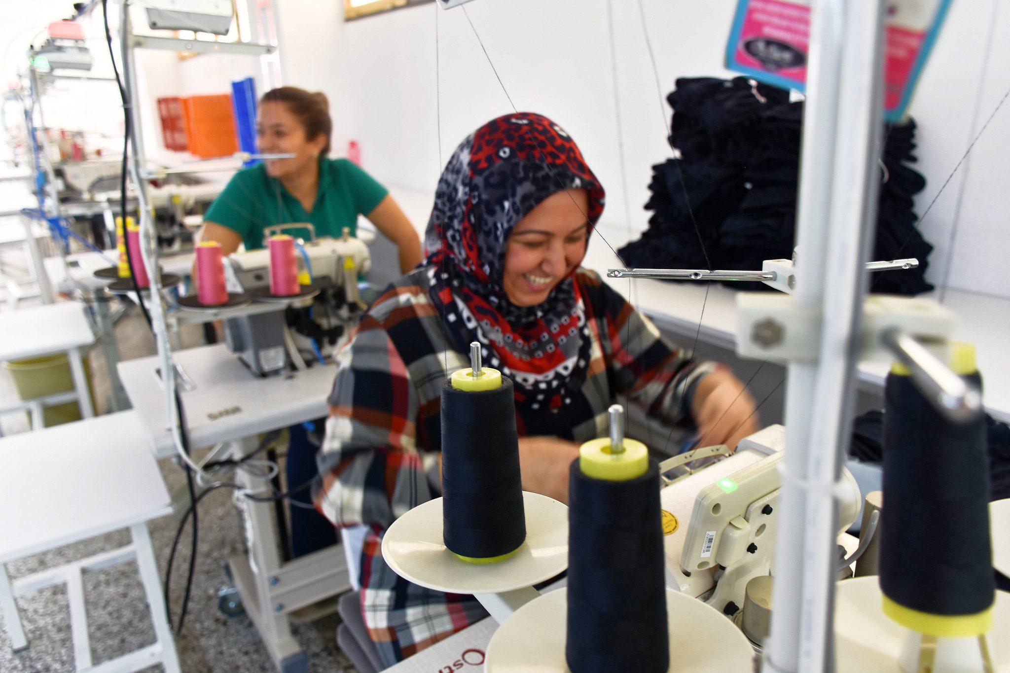 Women working at a textiles factory in Izmir; Turkish manufacturing has been hit by rising costs and interest rates but economic growth is still anticipated