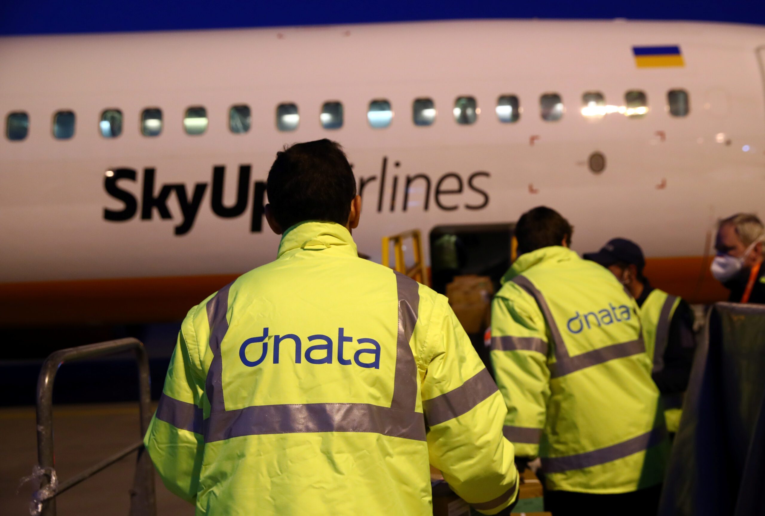 Dnata staff load cargo into a plane at Cointrin Airport in Geneva. The company's expansion into Rome will need a €20 million investment