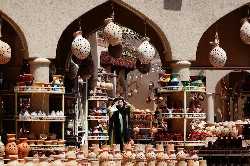 A seller at a souq in Oman. The country has been given a stable outlook, thanks to the positive impact of budget reforms and falling debt
