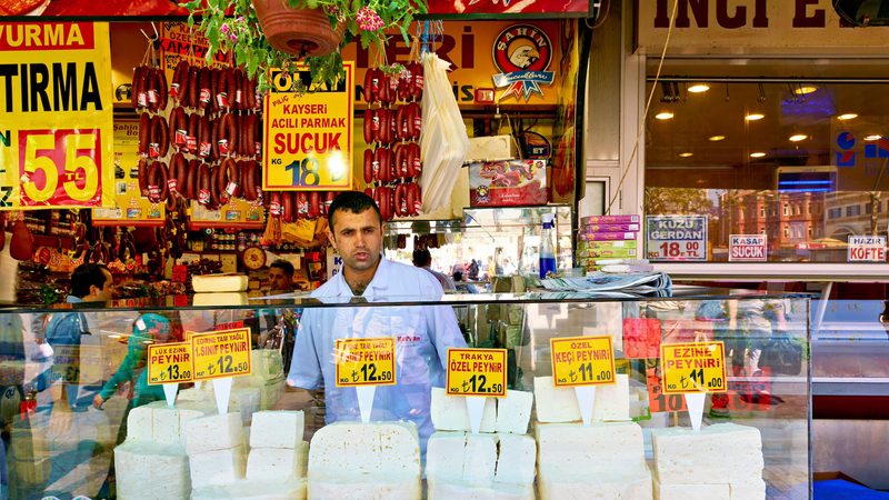 A stall holder in the Grand Bazaar in Istanbul. People in Istanbul faced rises in the cost of living this year, as soaring inflation impacted wages