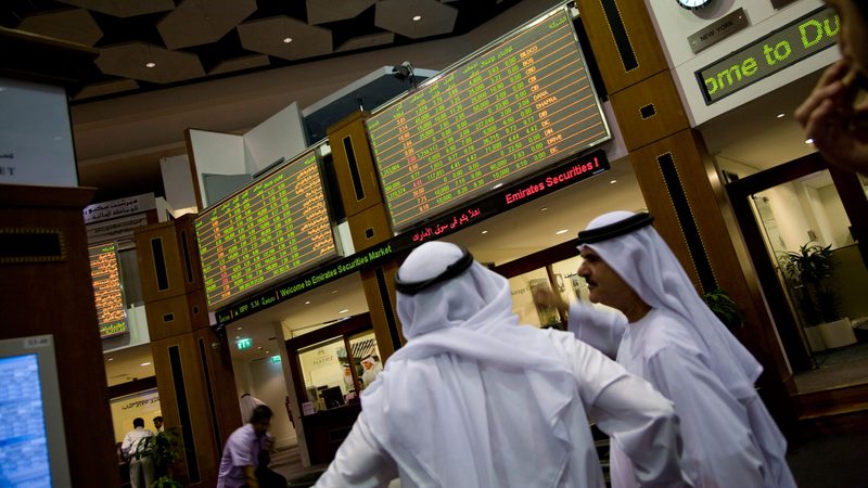 Traders at Dubai Financial Market - UAE businesses listing an IPO at DFM must have Securities and Commodities Authority approval