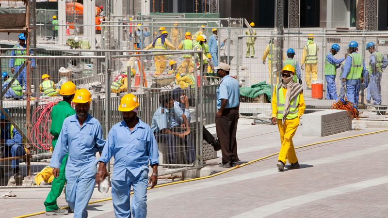 Construction workers in Dubai. Contractor Drake & Scull has completed its restructuring process