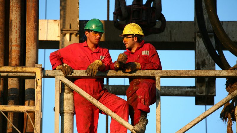 Oil workers on a rig in Libya's Sirte basin. The country's energy infrastructure needs large-scale investment, say analysts