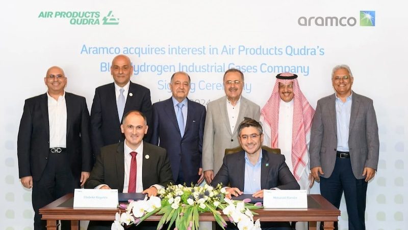 People, Person, Groupshot APQ CEO Ebubekir Koyuncu (sitting left) and Aramco acting senior vice president of new business development Mohanad M Alamdar at the signing ceremony