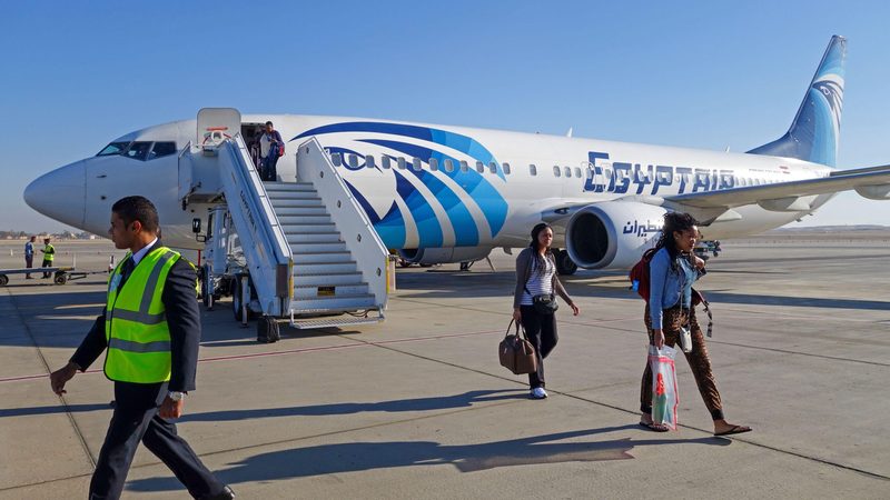 Passengers disembark an Egyptair plane at Luxor International Airport. The airline is loss-making even after post-pandemic recovery