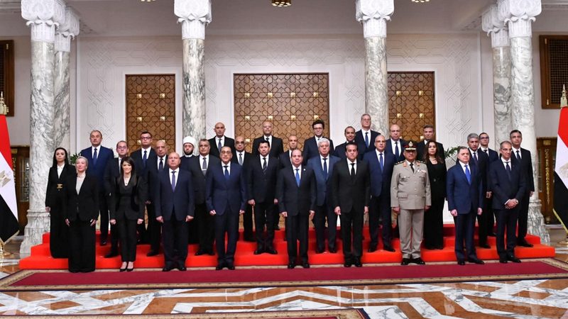 President Abdel Fattah al-Sisi poses for a group photo with Egypt's new cabinet
