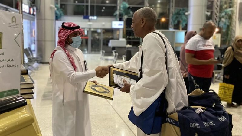 A Hajj pilgrim departs Saudi Arabia. Over 1.8m people took part in the pilgrimage in June, most of them arriving by air