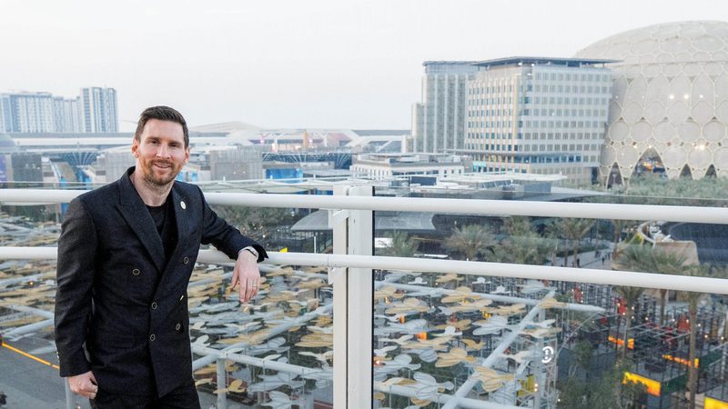 Lionel Messi poses for a photo at Dubai Expo 2020. He and his Argentina teammates will soon be appearing on 'giant billboard on Sheikh Zayed Road' to advertise property