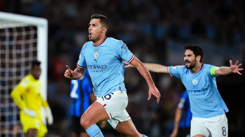 Rodri of Manchester City celebrates after scoring during the UEFA Champions League final match between Manchester City FC and Inter Milan in 2023; sponsorship of the team has raised Etihad's profile