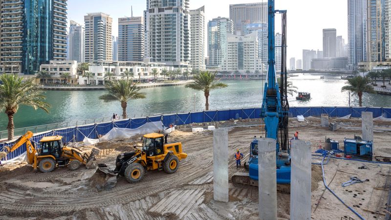 Construction work in Dubai Marina. With central locations filling up, developers are having to look for plots away from the city’s core