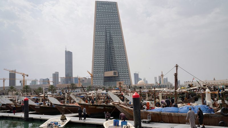 The Kuwait Central Bank towers over the harbour in Kuwait City. Kuwait has one more bank than Qatar but a banking system that is about half the size