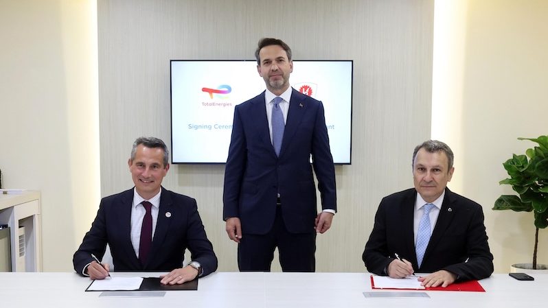 Botas and TotalEnergies executives sign the long-term LNG supply deal in the presence of Turkish energy and natural resources minister Alparslan Bayraktar