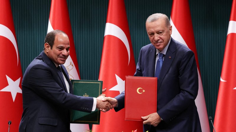 Egyptian president Abdel Fattah Al-Sisi and Turkish president Recep Tayyip Erdoğan shake hands after a signing ceremony in Ankara