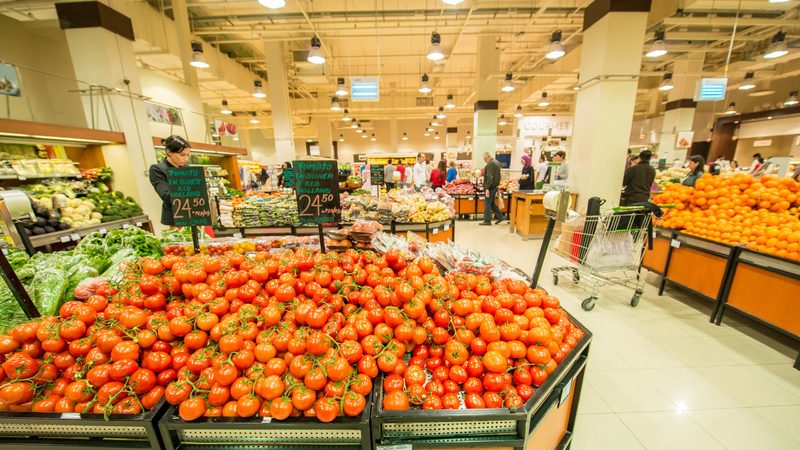 Abundant fruit and vegetables in a Dubai supermarket. Cheaper imported produce displaces locally grown food and generates too much waste