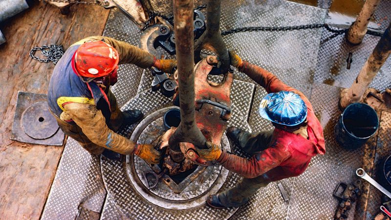 Workers on an oil rig in New Mexico, US. The incoming Trump administration is giving Opec+ plenty to think about