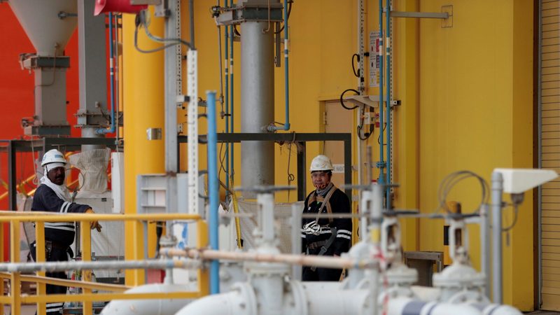 Workers are seen at the Borouge petrochemical facility at ADNOC's Ruwais Industrial Complex in Ruwais, United Arab Emirates May 14, 2018.