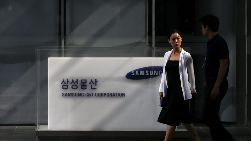 Employees outside Samsung C&T headquarters in Seoul, Korea; the company has won the contract to build a gas-fired power plant near Doha