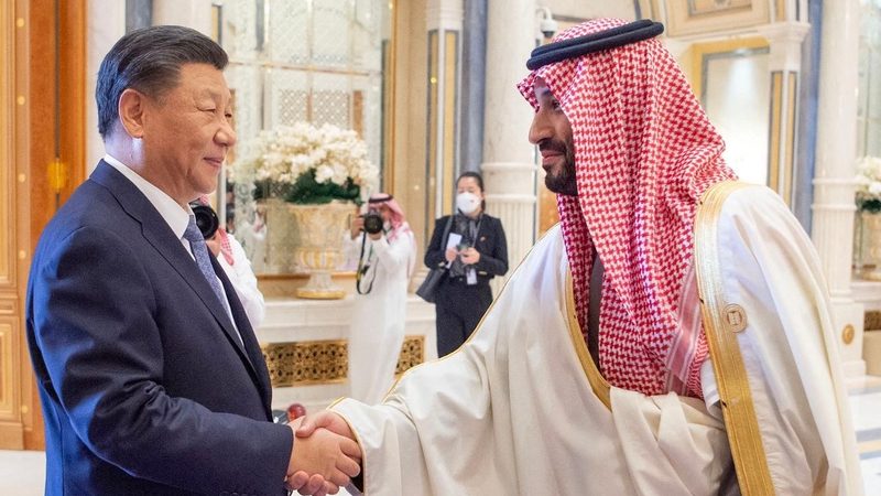 Saudi Crown Prince Mohammed Bin Salman, right, with China's President Xi Jinping. The report says Saudi Arabia could learn from Beijing's economic development