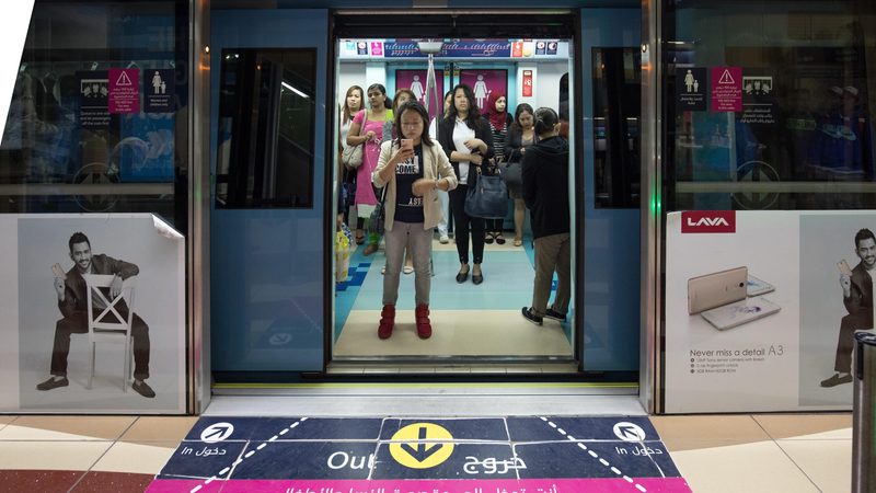 Passengers on the Dubai Metro. The planned Blue Line will connect with the existing Green and Red routes