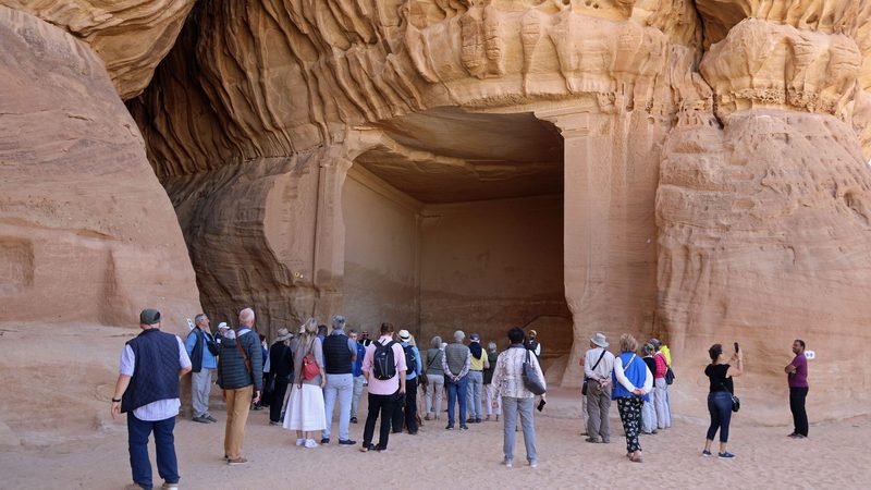 Tourists visiting Hegra in Saudi Arabia. PIF describes hotel management company Adeera as a 'national champion' for Saudi tourism