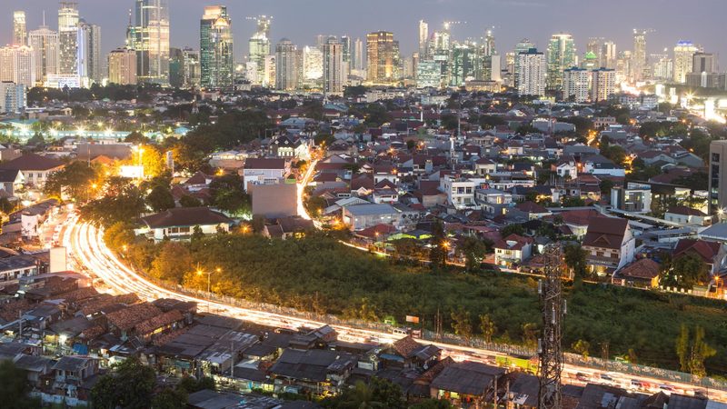 Jakarta's skyline blends colonial architecture with modern skyscrapers. Abu Dhabi and Qatar will support Indonesia's 15-million-home, five-year plan