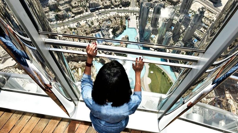 A tourist visiting Burj Khalifa in Dubai. UAE hotel revenues showed a 7 percent year-on-year increase