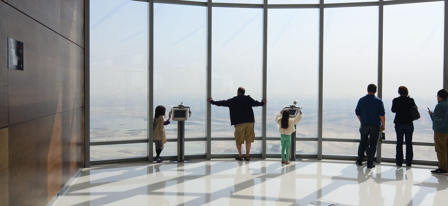 Airport, Accessories, Bag Visitors enjoy the view from the Burj Khalifa's observation deck