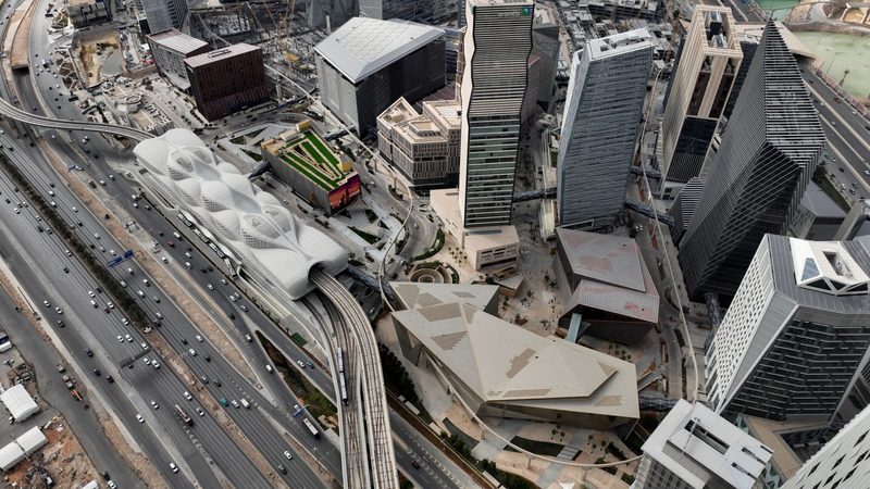 A photo taken by drone shows a train leaving the King Abdullah Financial District Metro Station in Riyadh last month – with more construction cranes in the background