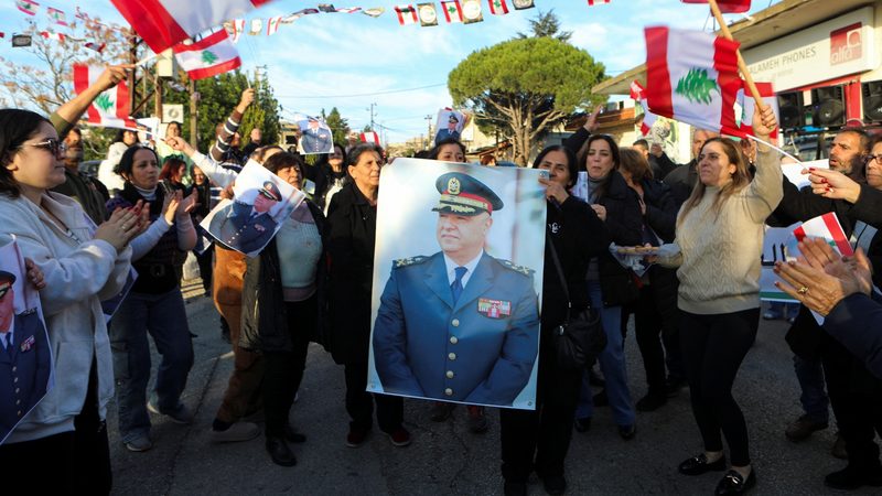 People celebrate after Lebanon's army chief Joseph Aoun was elected president, in the town of Klayaa, southern Lebanon