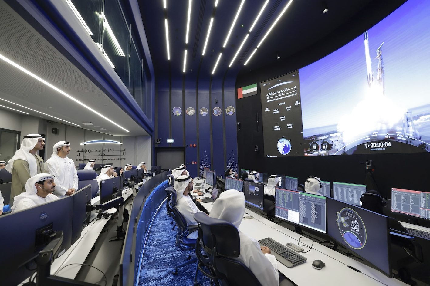 Staff at the Mohammed Bin Rashid Space Centre in Dubai watch the successful launch of a satellite, MBZ-SAT, on a SpaceX rocket this week