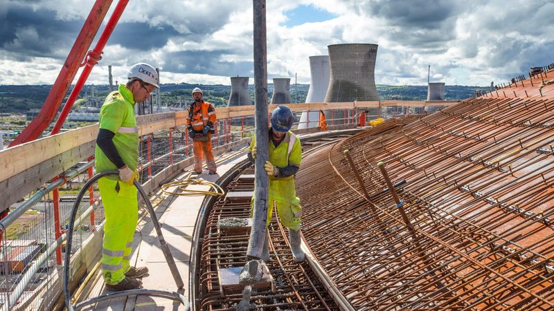 Workers constructing an ethane tank - a rise in prices of ethane and other fuels could help balance Saudi Arabia's Vision 2030 budget