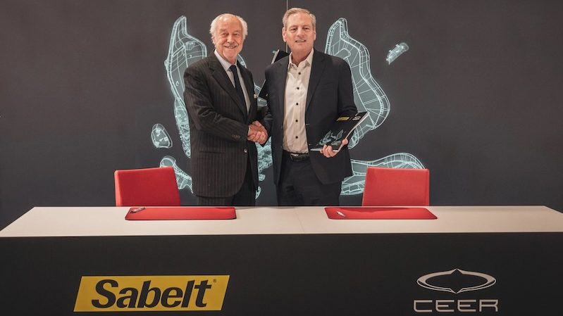 Giorgio Marsiaj, founder president and CEO of Sabelt and Jim DeLuca, CEO of Ceer at the deal signing ceremony