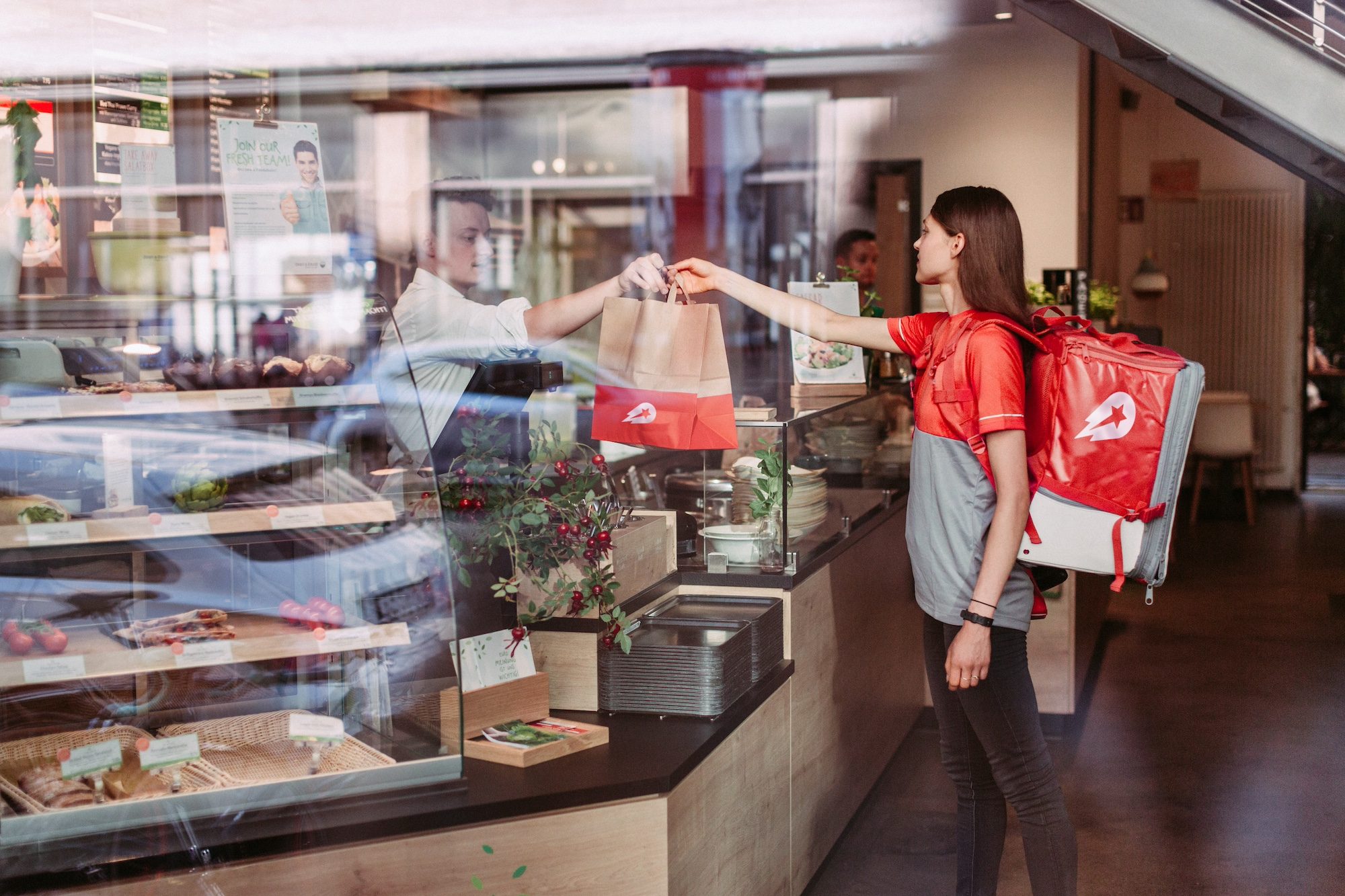 The Berlin-based food delivery company, which bought Talabat in 2015, said it will pay off its convertible bonds Delivery Hero