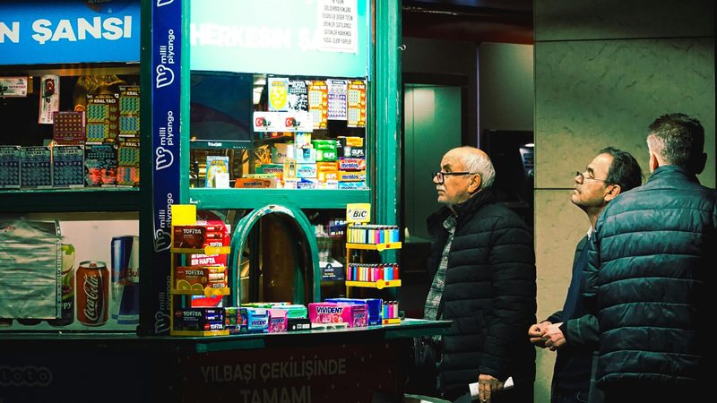 Men queue for tickets at a lottery stand in Turkey. The UAE Lottery has a weekly jackpot of AED100m