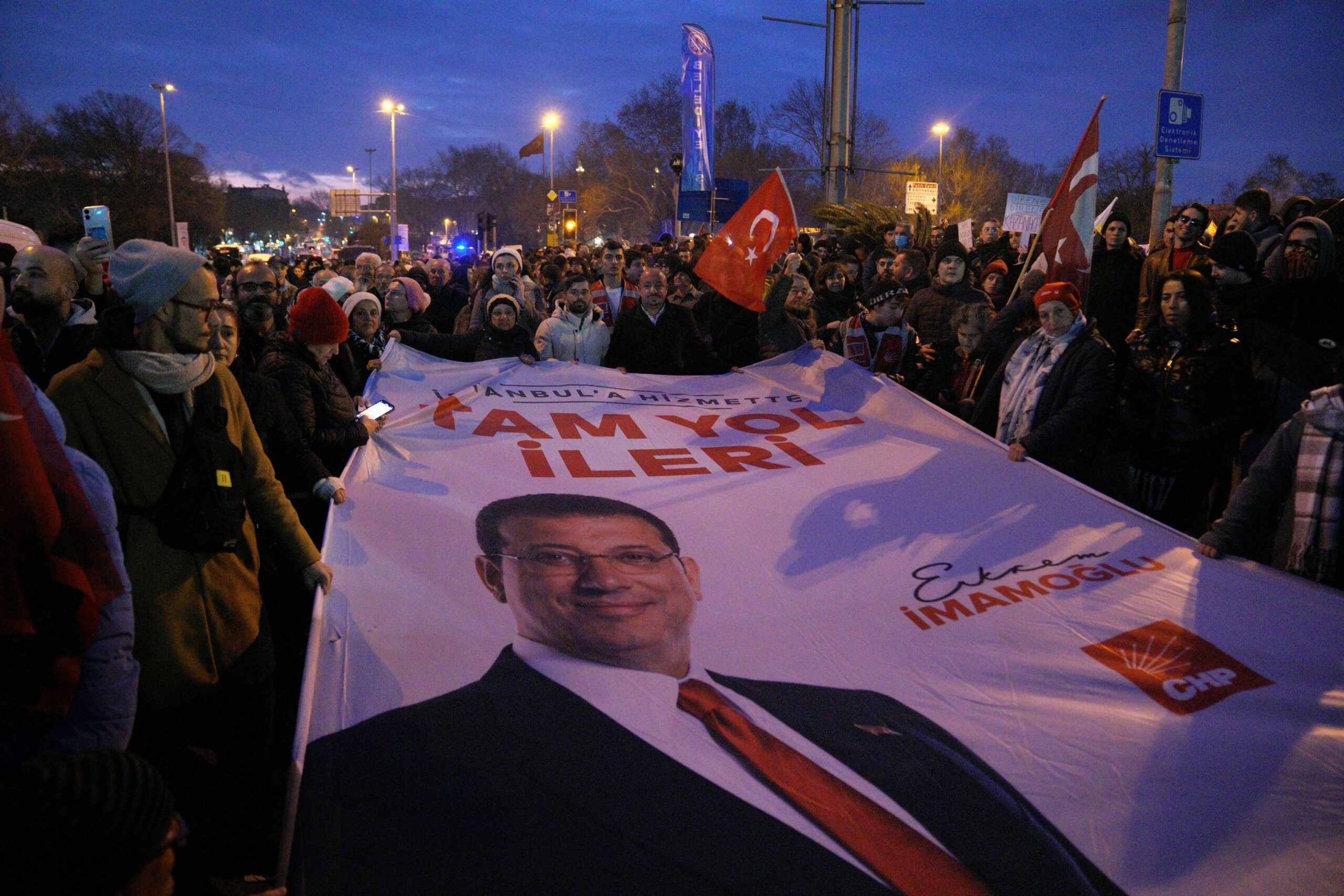 A banner with with Istanbul mayor Ekrem İmamoğlu's picture. Turkey's economy has been shaken by his arrest