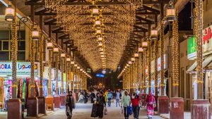 A shopping alley at the central Souq in Kuwait City hung with fairy lights