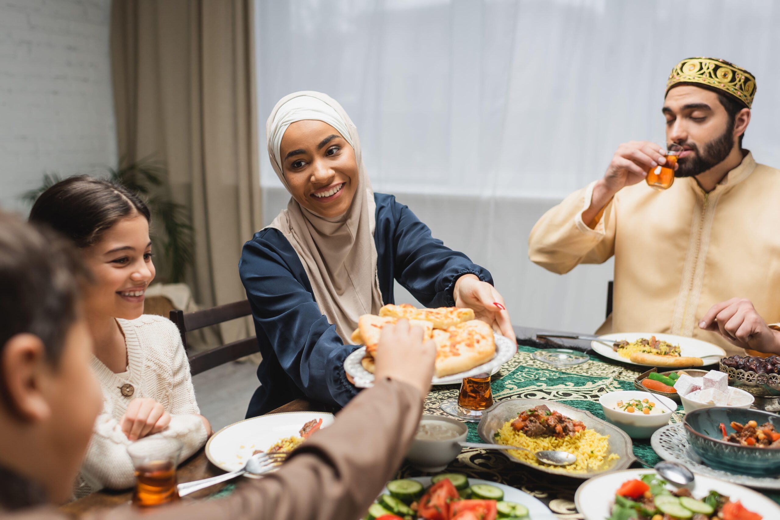 A family breaks fast during Ramadan. Omanis on low incomes might struggle to pay for Iftar, but extended family gatherings can be more cost-effective