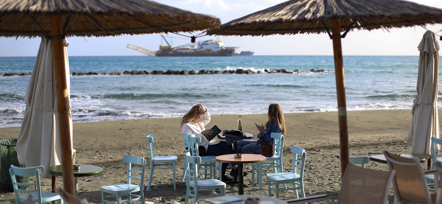 Two women relax in a waterfront cafe during the day in the Mediterranean port of Limassol. Cyprus, Tuesday, January 9, 2024. (Photo by Danil Shamkin/NurPhoto)NO USE FRANCE