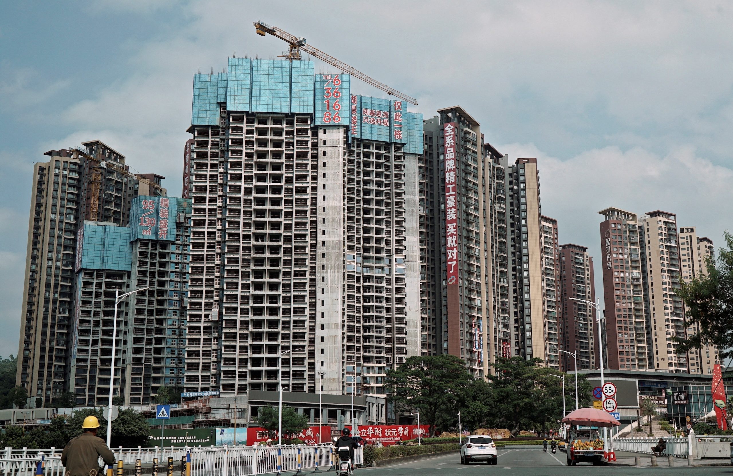 Apartment blocks under construction in Huizhou, Guangdong province. China's real estate sector has contracted sharply in recent years